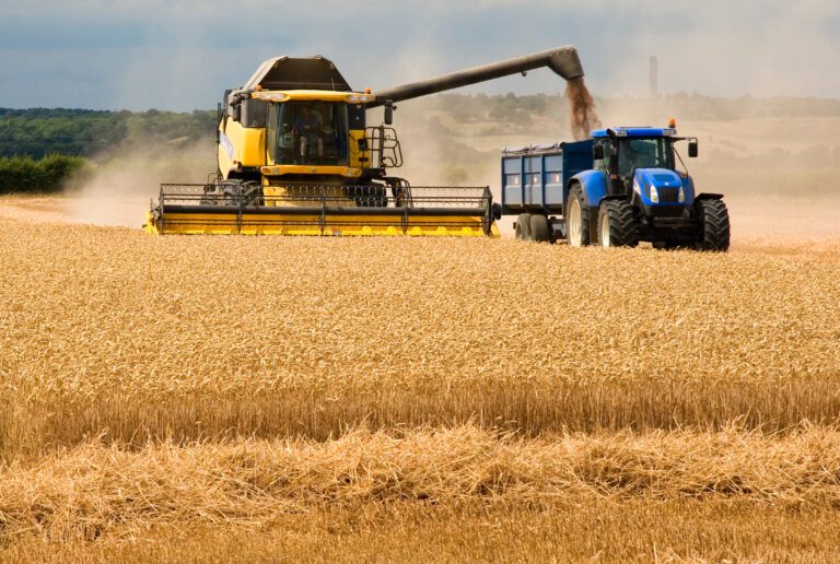 Combine Harvester Loading Tractor